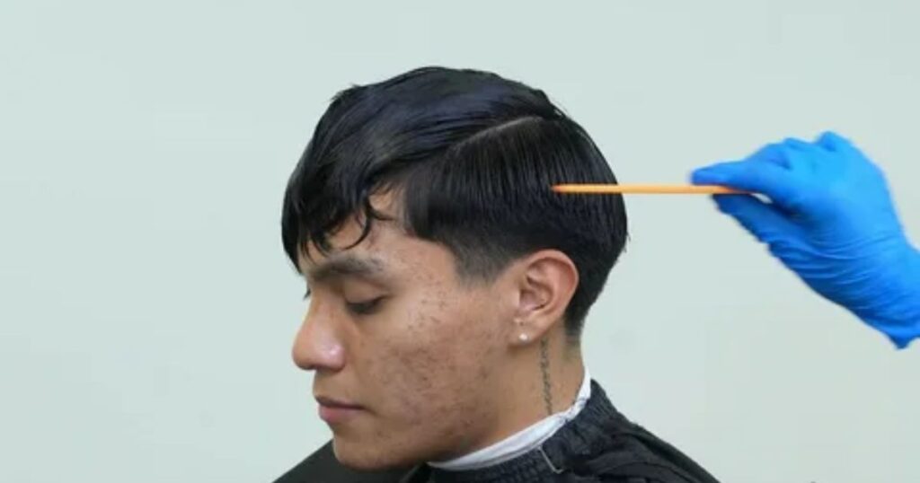 Understanding the Low Taper Fade with Middle Part