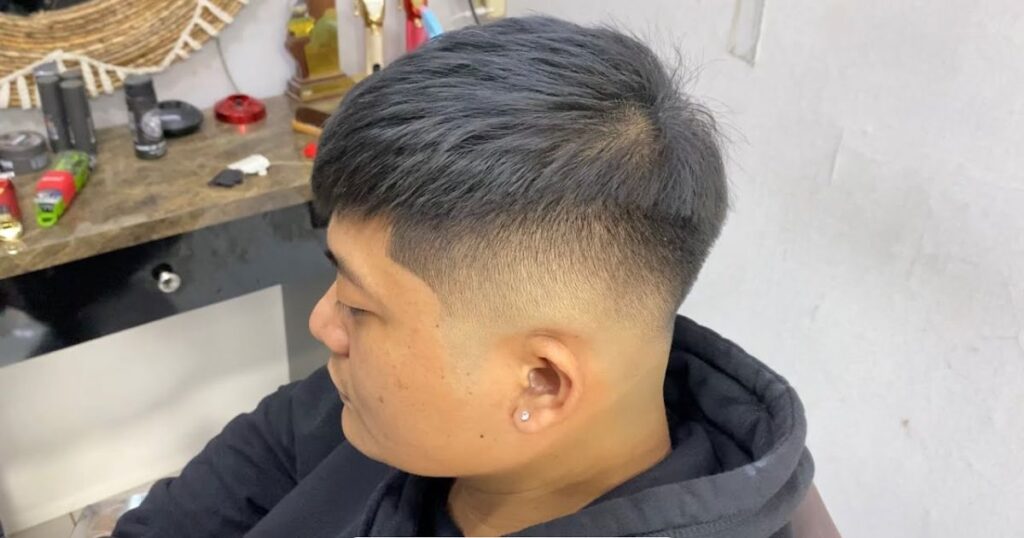 Low Taper Fade With Asian Fringe
